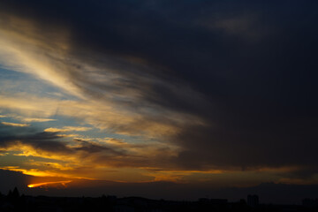 dramatic sunset. color. background with clouds.