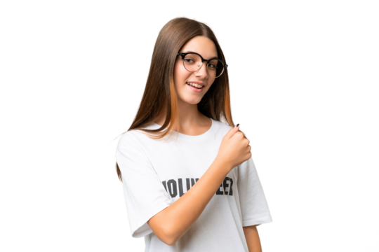 Teenager volunteer caucasian girl over isolated background celebrating a victory