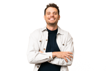 Brazilian man over isolated chroma key background keeping the arms crossed in frontal position