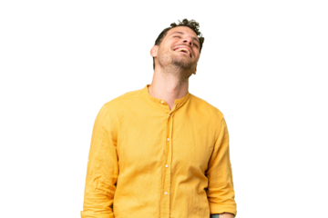 Brazilian man over isolated chroma key background laughing