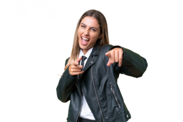Business pretty Uruguayan woman wearing a biker jacket over isolated background pointing to the front and smiling