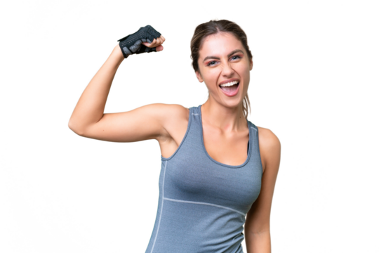 pretty Sport Uruguayan woman over isolated background doing strong gesture