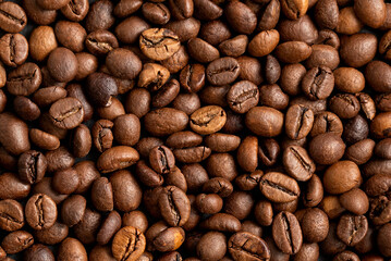 Roasted coffee beans close up food and drink background