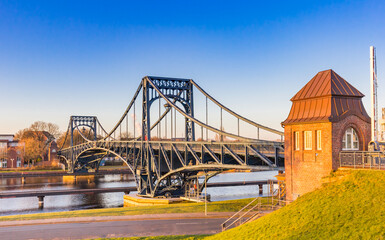 Fototapeta na wymiar Colorful sunlight over the historic bridge in Wilhelmshaven, Germany