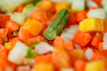 Vegetables mixture of chopped, frozen vegetable, close-up macro view, selective focus