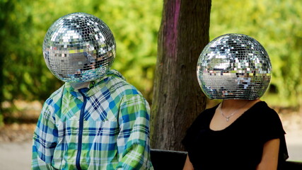 People with mirror balls in their heads, watching everything around them