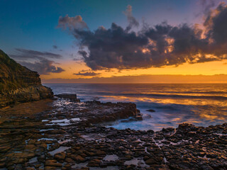 Dawn at the seaside and rock platform