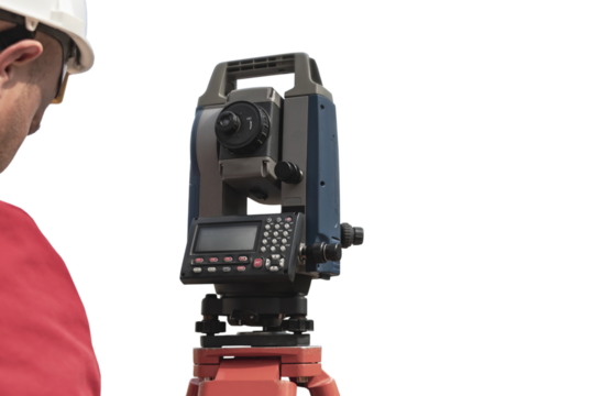 Surveyor engineer measures the level on a white isolated background. Surveyors provide accurate measurements before embarking on large construction projects.