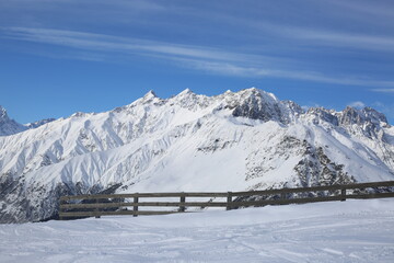 Fototapeta na wymiar Beautiful snow mountains landscape. Winter ski resort.