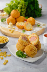 Macaroni Balls baked with melted cheese

