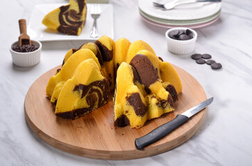 A Homemade cake made of chocolate and vanilla 
