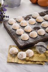 Fototapeta na wymiar Kue putri salju or snow white cookies. islamic cookies biscuit for eid mubarak tradition