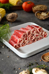 fresh beef raw sliced with marbled texture served for Sukiyaki and Shabu or Yakiniku
