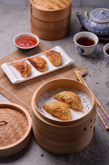 Kuotie is the Chinese-Indonesian interpretation of guotie. It basically tastes very similar to guotie, the main difference is that kuotie is much more garlicky in flavour. 
