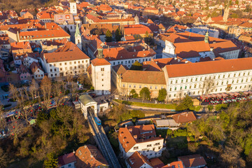 Fototapeta na wymiar Funicular and medieval Lotrscak tower in Zagreb, Croatia. Upper Town of Zagreb in Background