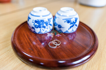 Wedding Ring on Japanese Table with Cups of Tea. Kyoto, Japan