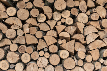 Firewood Outdoor, Brown Background. Dry Chopped Firewood logs in a pile