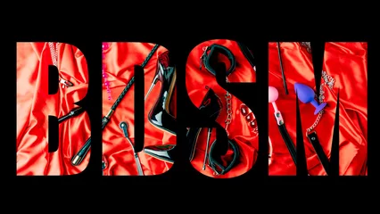 Creative BDSM lettering on a black background. Set of sexy erotic toys © filins