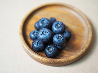 blueberries on wooden background