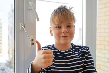 safety at home for small children. a lock on the window protects children from opening the window....
