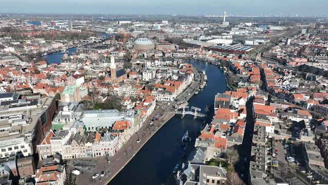 Soar over the charming city center of Haarlem and capture stunning views of the Bakenesserkerk's towering spire.