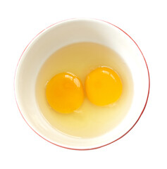 Raw egg yolks in a bowl. Uncooked egg yolk png. Top view.