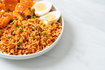 Korean instant noodles with Korean rice cake and fish cake and boiled egg