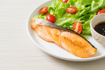 grilled salmon fillet steak with salad