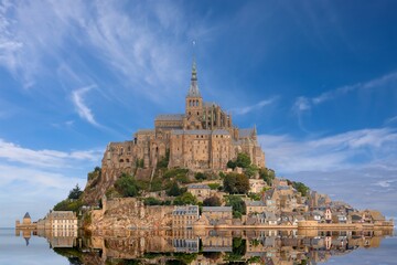 abbey above the mountain called Mont Saint Michel one of the most visited places in France