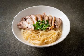 dried duck noodles in white bowl