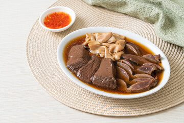 stewed duck offal in brown soup