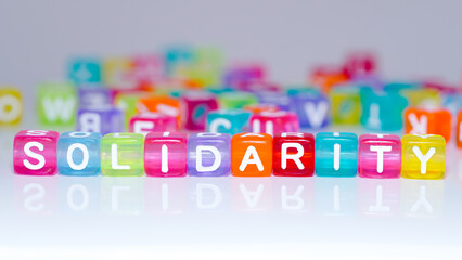 solidarity word in colorful blocks. text, words in colorful cubes. fun concept of caring for others, solidarity.