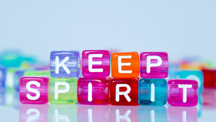 keep spirit phrases in colorful blocks. words in blocks. the concept of keeping the spirit