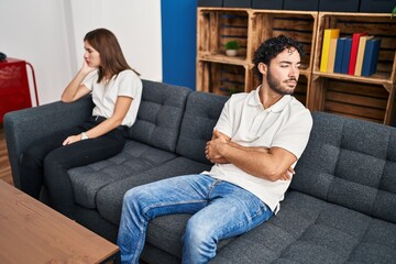 Fototapeta premium Man and woman couple arguing at home