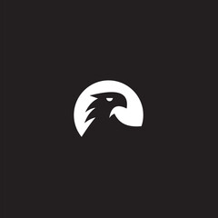 Eagle logo. The logo is made with an eagle with outstretched wings incorporated into the design. Color is white .