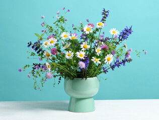 Vase with beautiful spring bouquet