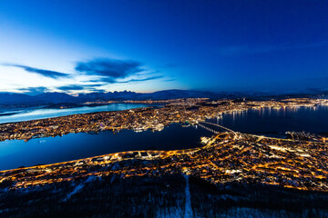 Night view over arctic city of Tromsø, Norway from Fjellheisen mountain