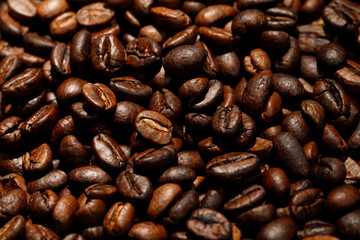 photo macro close up texture of roasted coffee beans dark, can be used as a background..
