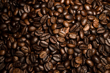photo macro close up texture of roasted coffee beans dark, can be used as a background..