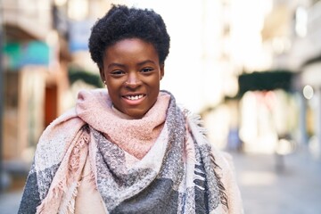 African american woman smiling confident standing at street