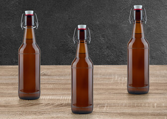 Flip top beer bottles mockup isolated on wooden background