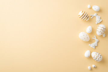 Easter atmosphere concept. Top view photo of white and gold easter eggs and easter bunny silhouettes on isolated light beige background with blank space