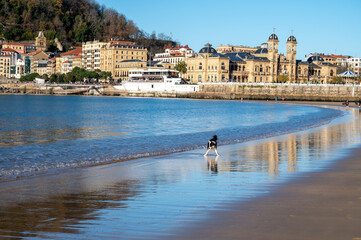 White sandy La Concha beach in central part of Donostia or San Sebastian city, Basque Country, Spain