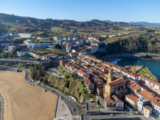 Obraz premium Sunny winter day in small fisherman's village Getaria near San Sebastian city, Basque Country coastline, Spain