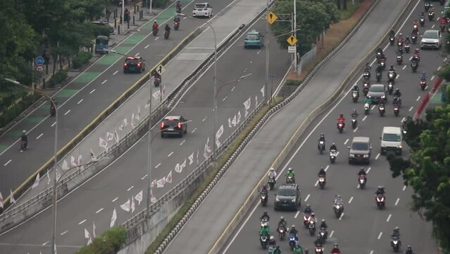 Flyover Pramuka daytime road traffic timelapse