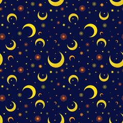 Seamless pattern with yellow and orange moons on a navy blue background