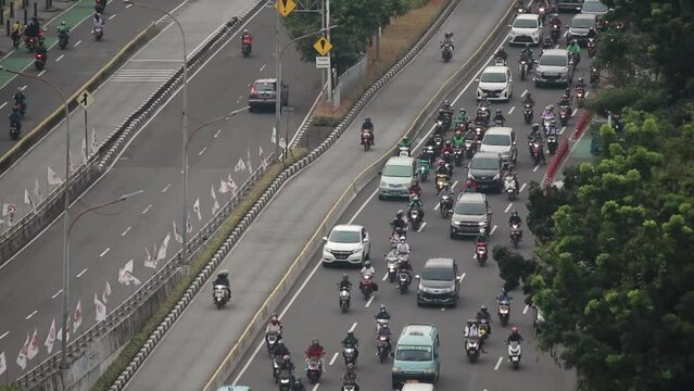 Flyover Pramuka daytime road closeup traffic