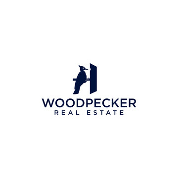 woodpecker real estate logo
