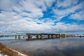 Fototapeta na wymiar Tczew, historical bridge on Wisla river in Pomeranian Voivodeship, Poland at winter
