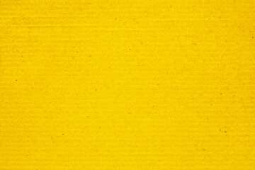 Yellow craft paper close-up, sheet of cardboard. Background.	